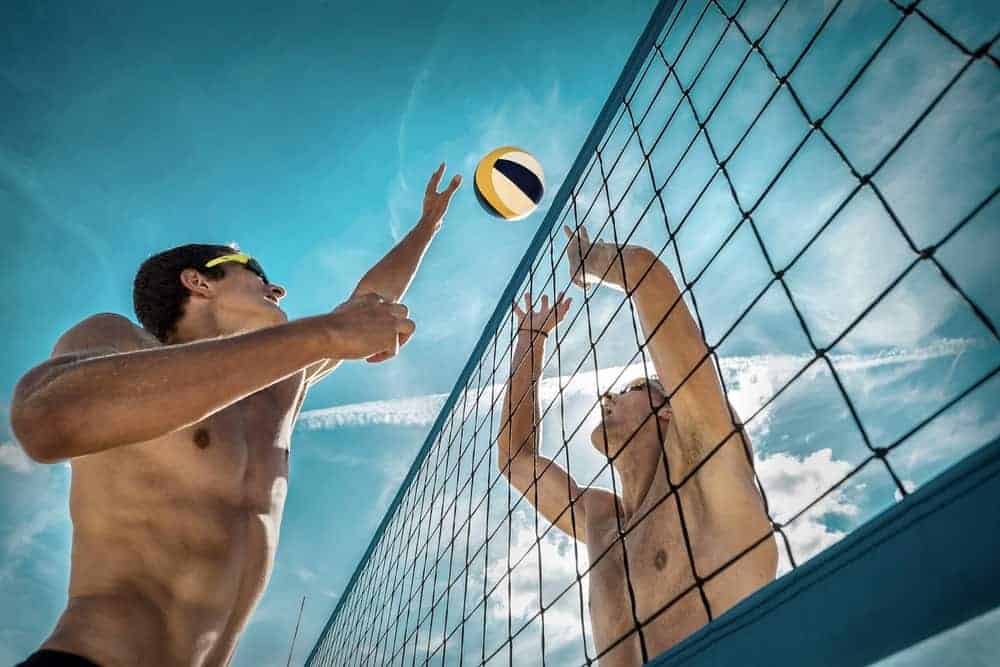 Beach,Volleyball,Players,In,Sunglasses,Under,Sunlight.,Dynamic,Sport,Action